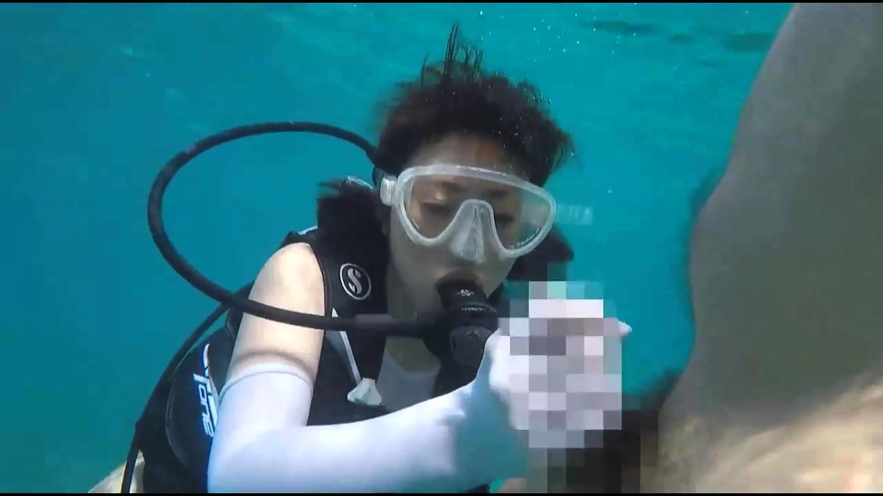 Seductive Japanese Beauty Gives A Nice Handjob Under Water Video at Porn Lib