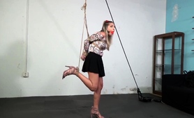 sultry-blonde-milf-with-sexy-legs-gets-tied-up-and-suspended