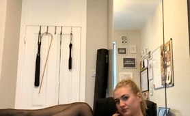 provoking-blonde-milf-posing-in-black-lingerie-on-webcam