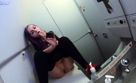 Wild Babe Fingering Herself To Climax In Public Toilet